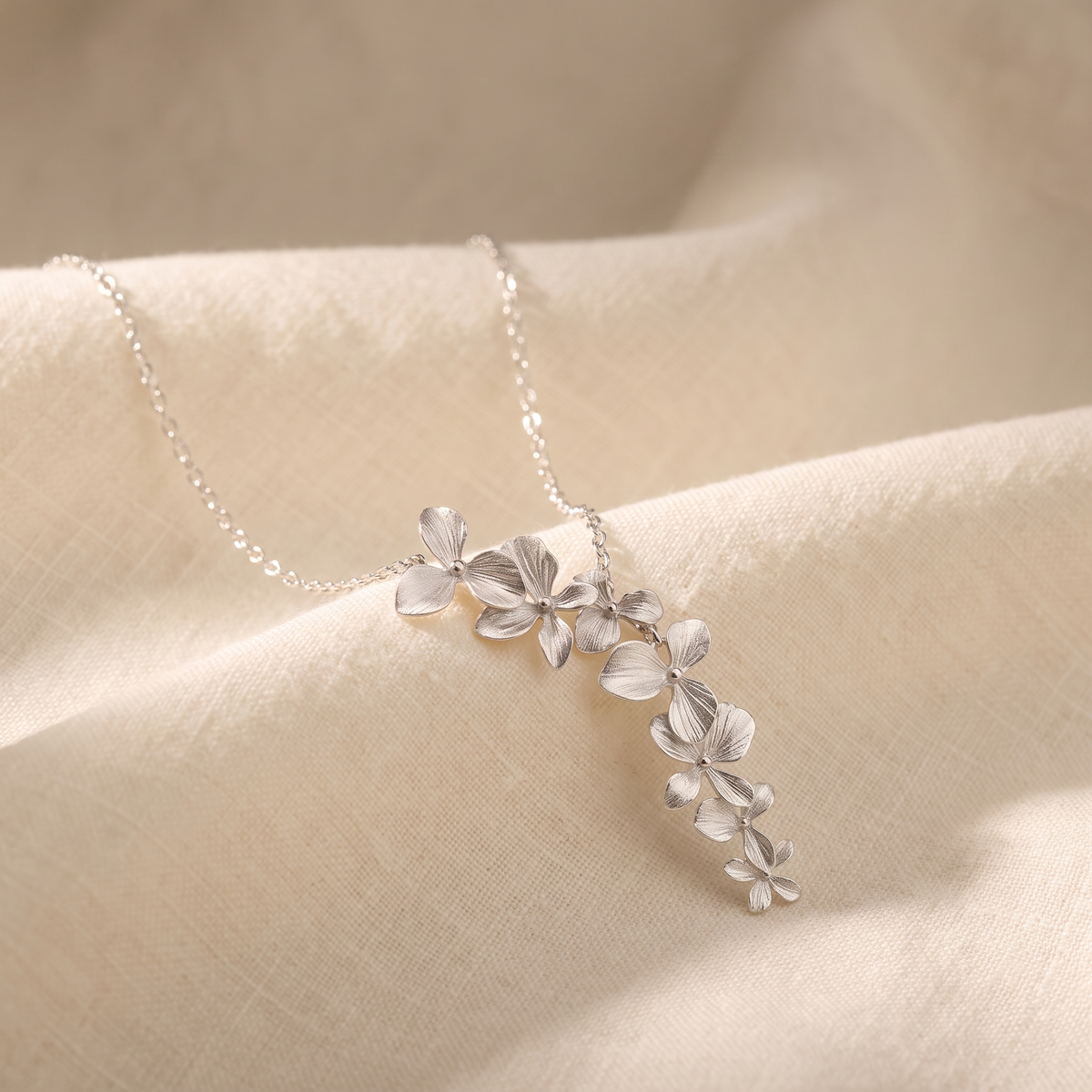 Stephanie – A delicate circular design gold necklace.